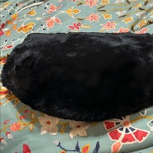 Black sheared rabbit fur hand warmer with zippered pocket
